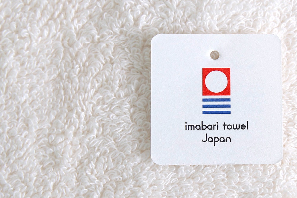 Ikeuchi's organic towels are so absorbent that they sink within 5 seconds of being placed on water